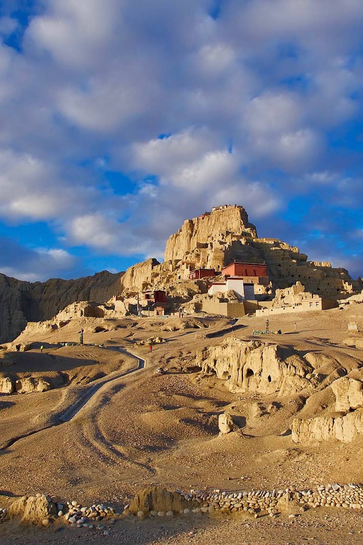 Ancient mountain monastery with cloudy sky